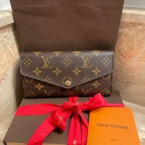 Louis Vuitton wallet 100%Authentic. Sarah NM3 Monogram